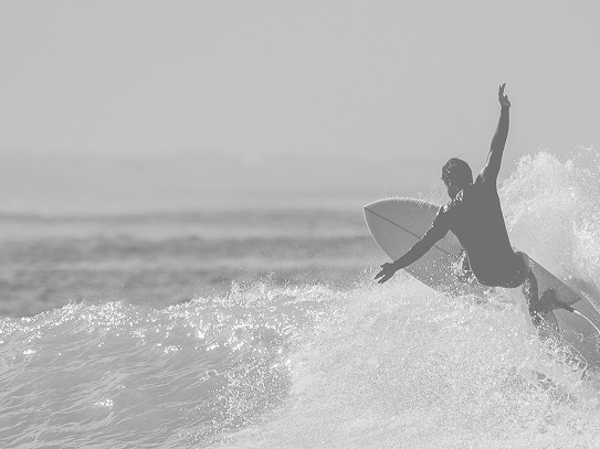 Surfer progressing after coaching